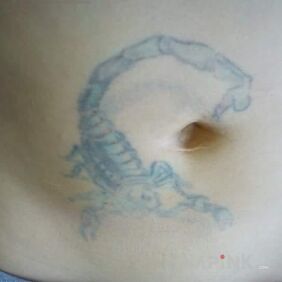 Tattoo Scorpio on the stomach motif: zodiac signs