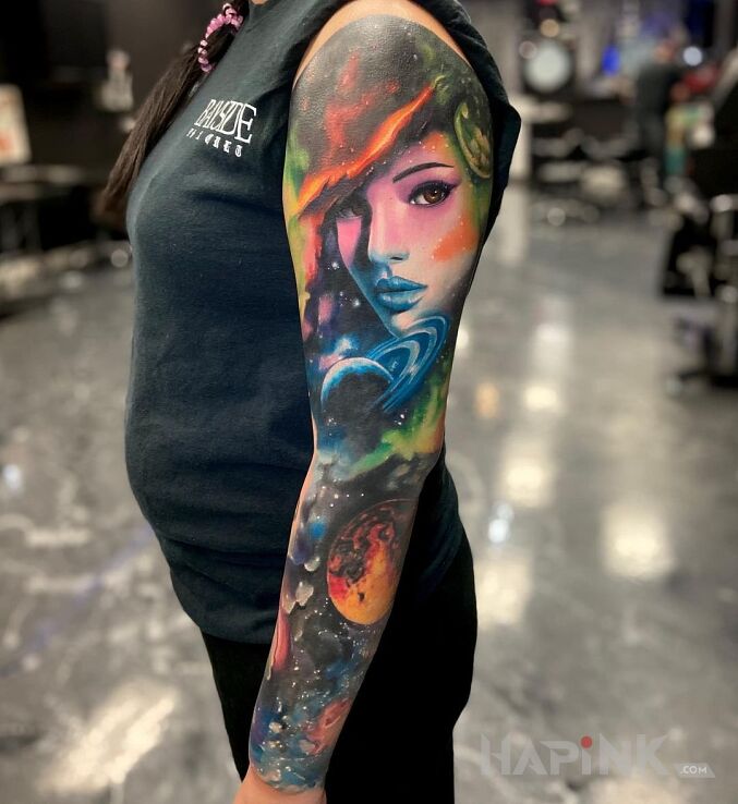 Tattoo Kobieta z kosmosu in sleeves motif and realistic style On the arm