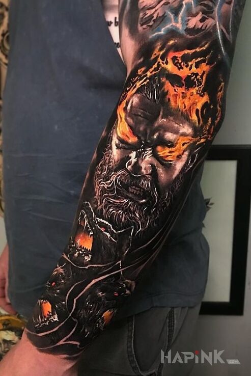 Tattoo Człowiek ogień in colorful motif and realistic style On the arm