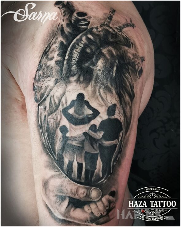 Tattoo Family, heart in characters motif and realistic style On the arm