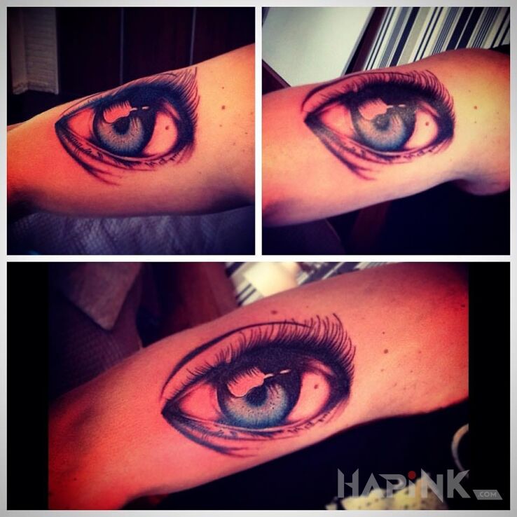 Tattoo Oko in 3D motif and realistic style on the upper arm