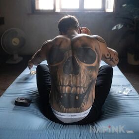 Tattoo Skull on the back motif: skulls style: blackwork / blackout