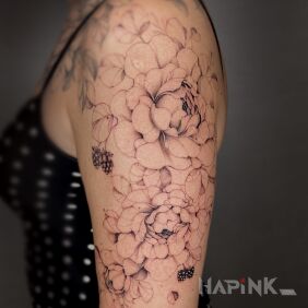 Tattoo Delicate flowers On the arm motif: floral style: realistic