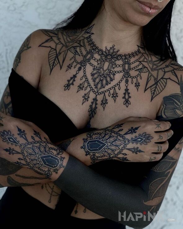 Tattoo Drogocenne dziarki in sleeves motif and blackwork / blackout style on the shoulder