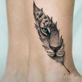 Tattoo Tiger in a feather on the leg motif: animals style: realistic