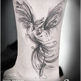 Tattoo Phoenix on the leg motif: fantasy style: graphic / illustrative