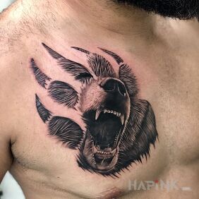 Tattoo Bear in the paw on the chest motif: black and gray style: realistic