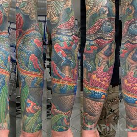 Tattoo Chameleon in color on the forearm motif: nature style: realistic