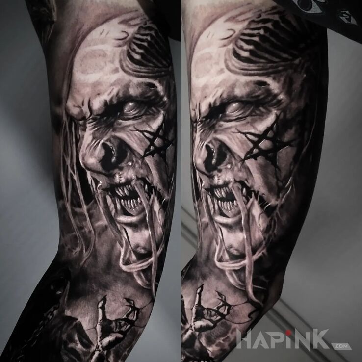 Tattoo Hell in dark motif and realistic style On the arm