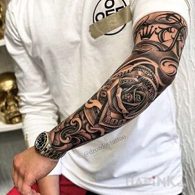 Tattoo Rose elbow on the upper arm motif: black and gray style: graphic / illustrative