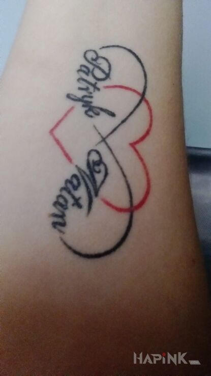 Tattoo Serce z imionami in other motif on the forearm