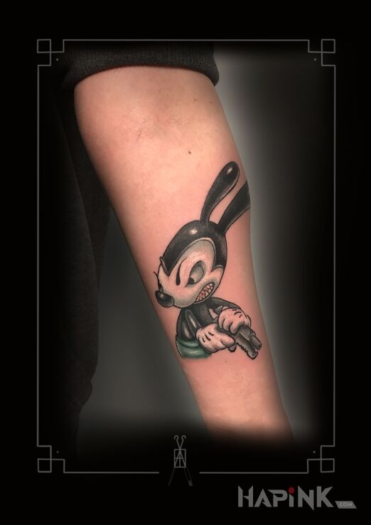 Tattoo Angry miki in characters motif and newschool style on the forearm