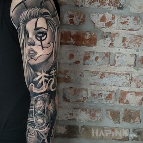 Tattoo Half sleeve chicano On the arm motif: black and gray style: realistic