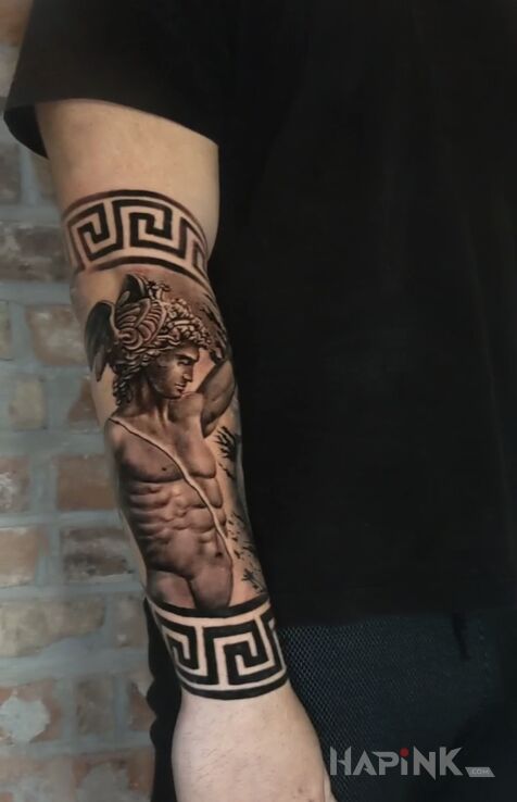 Tattoo Heros in characters motif and realistic style On the arm