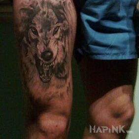 Tattoo Wolf, wolf on the leg motif: animals style: realistic