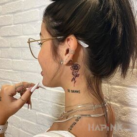 Tattoo Brave rose on the neck motif: black and gray style: graphic / illustrative