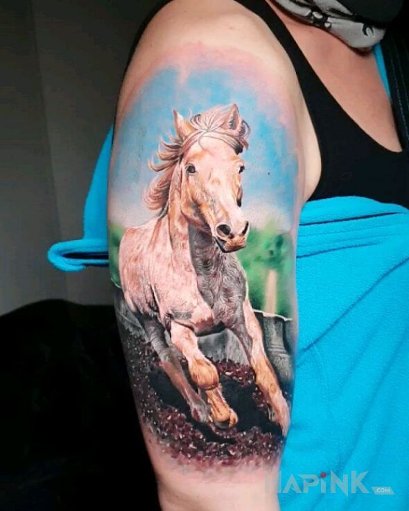 Tattoo Koń w błocie in 3D motif and realistic style on the upper arm