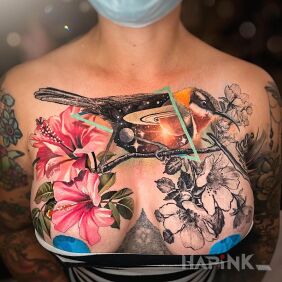 Tattoo Sparrow on flowers on the chest motif: colorful style: realistic