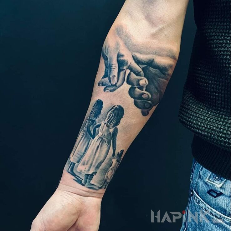 Tattoo Rodzina in black and gray motif and realistic style On the arm