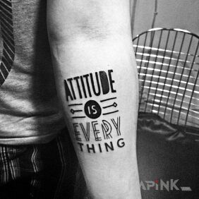 Tattoo Attitude is everything on the forearm motif: lettering