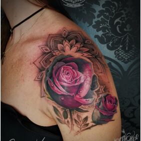 Tattoo Rose cover on the upper arm motif: mandalas style: realistic