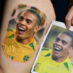 Tattoo Ronaldo on the thigh motif: Sport style: realistic