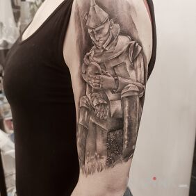 Tattoo Personal theme On the arm motif: characters style: realistic