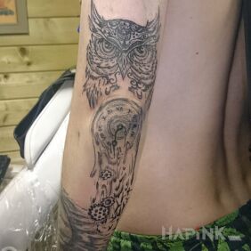 Tattoo Owl on the upper arm motif: animals