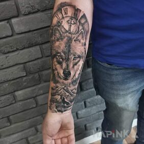 Tattoo Who doesn't love wolves on the forearm motif: black and gray style: realistic