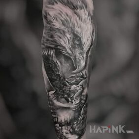 Tattoo Eagle - classic on the forearm motif: black and gray style: realistic