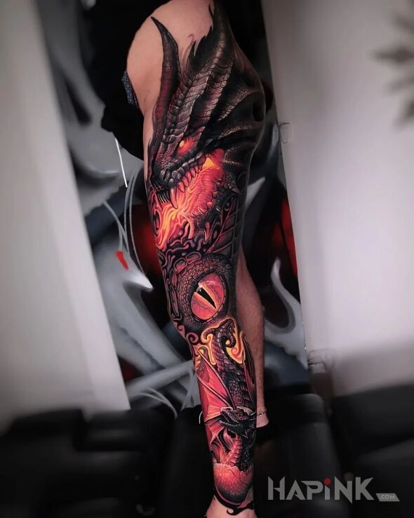 Tattoo Ogień to jego żywioł in colorful motif and realistic style on the leg