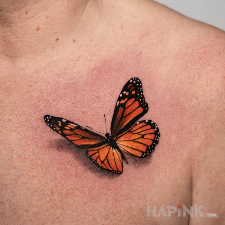 Tattoo Motyl in 3D motif and realistic style on the collarbone