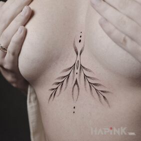Tattoo Underboob between the breasts motif: floral style: dotwork
