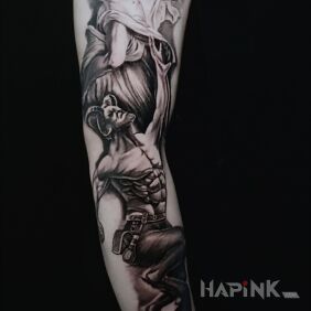 Tattoo Satyr, half sleeve on the upper arm motif: faces style: graphic / illustrative