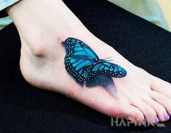 Tattoo Motyl in 3D motif and realistic style on the foot