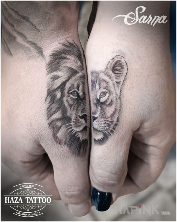 Tattoo Couple lion tattoo in black and gray motif and realistic style on the hand
