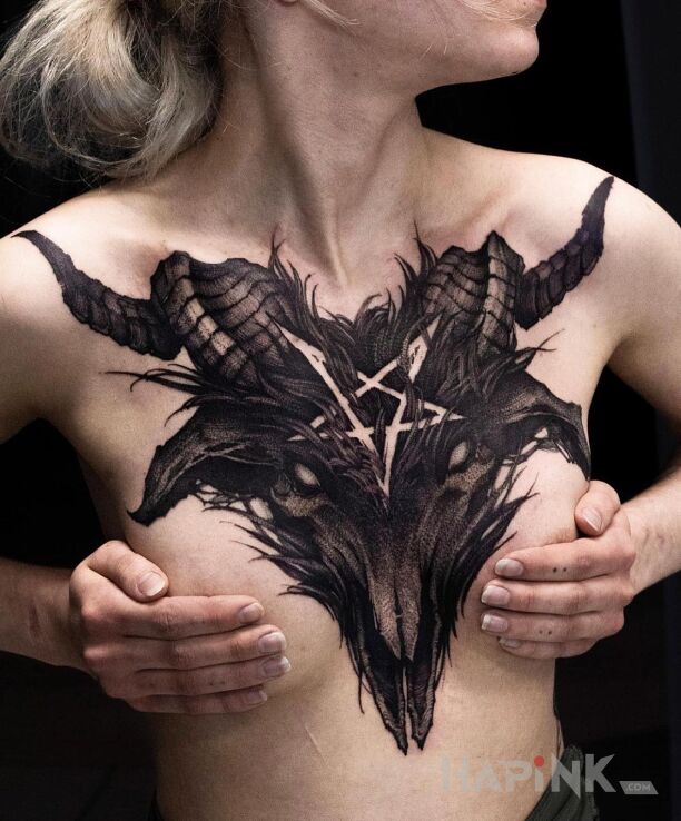 Tattoo Głowa szatańskiego barana in religious motif and graphic / illustrative style on the collarbone