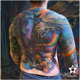 Tattoo Colorful back piece shot 2 On the arm motif: other style: surrealistic