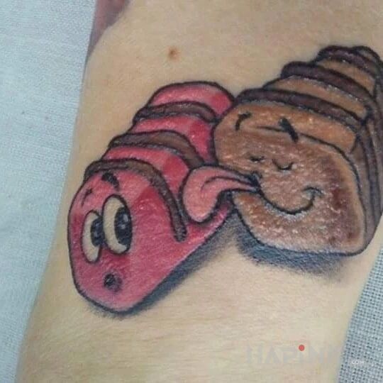 Tattoo Słodziaki in funny motif and cartoon / comic book style on the wrist