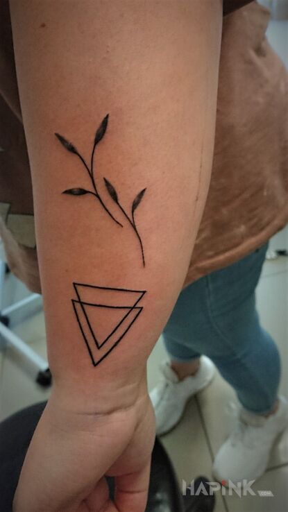 Tattoo Malutki in other motif and minimalistic style On the arm