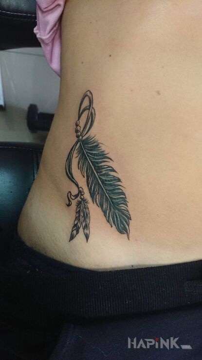 Tattoo Cover in cover-up motif and graphic / illustrative style on the stomach