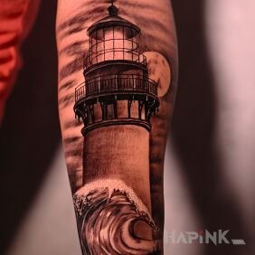 Tattoo Lighthouse on the forearm motif: other style: realistic