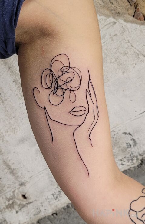 Tattoo Poplątane myśli in other motif and contour / linework style On the arm