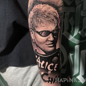 Tattoo Alice in Chains On the arm motif: lettering style: realistic