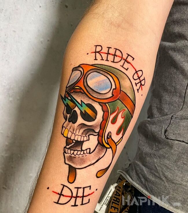 Tattoo Ride or Die in colorful motif and graphic / illustrative style On the arm