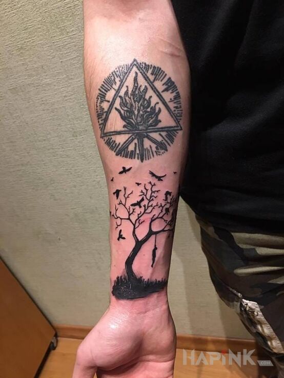 Tattoo Wisielec in other motif on the forearm