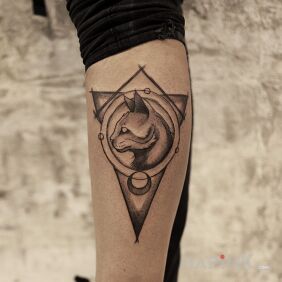 Tattoo Kitty in a frame on the leg motif: black and gray style: graphic / illustrative