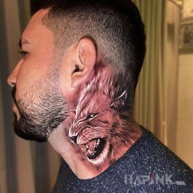Tattoo Nervous lion on the neck motif: animals style: realistic