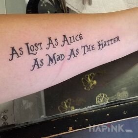 Tattoo Alicia on the forearm motif: lettering