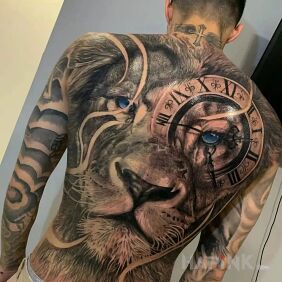 Tattoo Lion the guardian of time on the shoulder blades motif: animals style: realistic